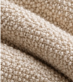 Boucle upholstery textile swatch with looped yarn texture